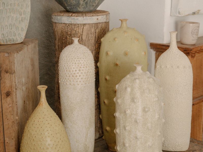 Cream ceramic vases in different shapes