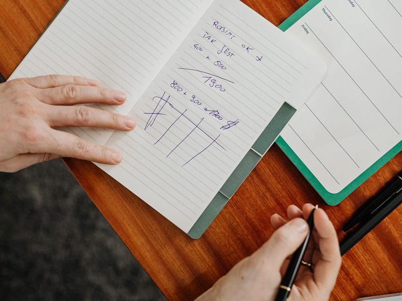 Writing numbers in a notebook