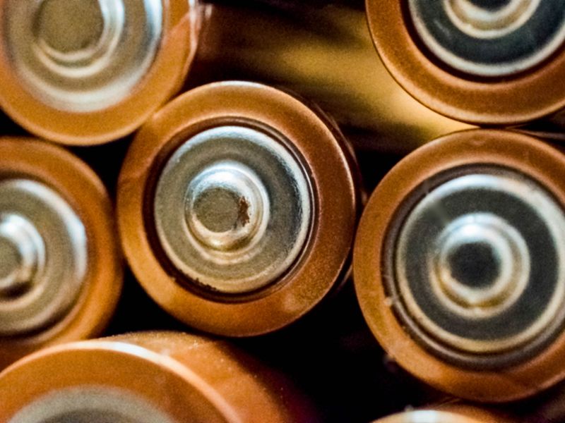 Close-up of stacked batteries