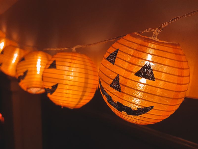Glowing jack-o-lantern paper lantern lights