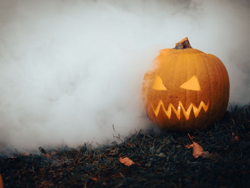 Jack-o-lantern in rolling fog
